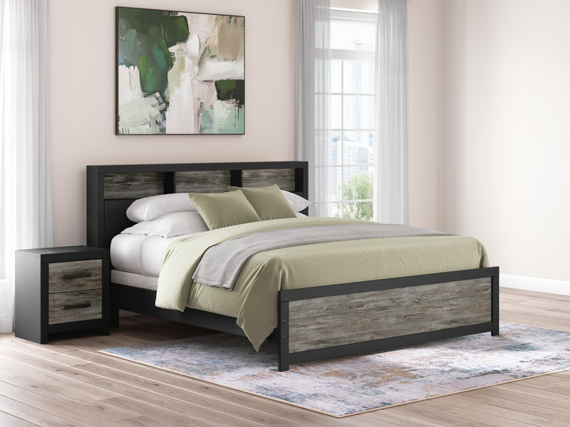 Ashley Furniture Broachmyn Bed in a dark wood finish, showcasing the elegant headboard and sturdy frame design.