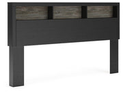 Ashley Furniture Broachmyn Bed with a dark wood finish, showcasing a stylish bed frame with a headboard and footboard design.