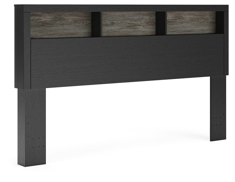 Ashley Furniture Broachmyn Bed with a dark wood finish, showcasing a stylish bed frame with a headboard and footboard design.