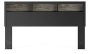 Ashley Furniture Broachmyn Bed with a headboard featuring a dark finish and elegant design, shown from a front angle.