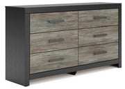 Ashley Furniture Broachmyn dresser and mirror set, featuring a stylish wooden dresser with an attached mirror, shown from an angled side view.
