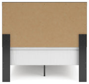 Ashley Furniture Broachmyn Bed with a stylish headboard and neutral fabric upholstery, shown from the back view.