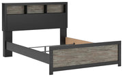 Ashley Furniture Broachmyn Bed with a sturdy wooden frame and elegant design, shown from an angle in a well-lit bedroom setting.