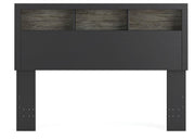 Ashley Furniture Broachmyn Bed shown from head-on view, showcasing its elegant design and headboard details.