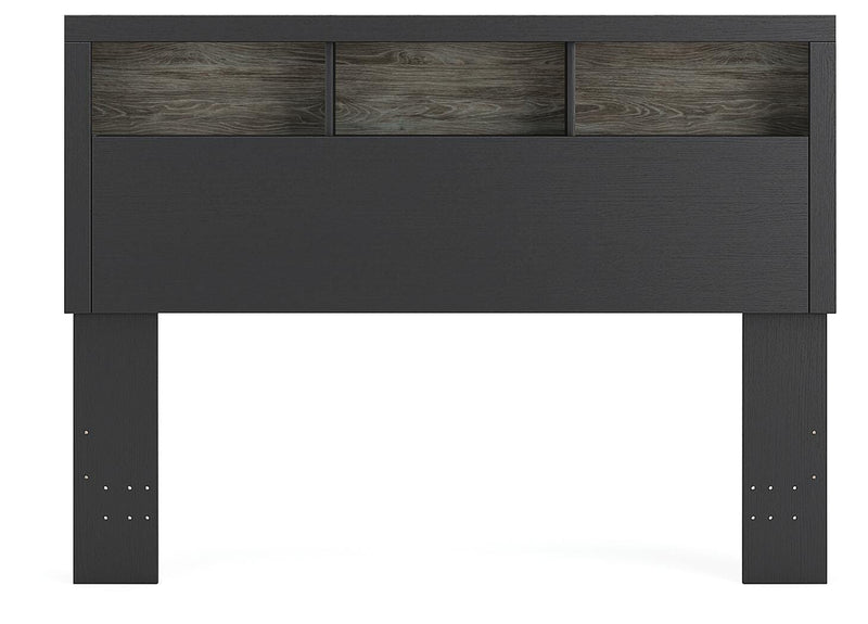 Ashley Furniture Broachmyn Bed shown from head-on view, showcasing its elegant design and headboard details.