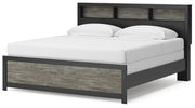 Ashley Furniture Broachmyn Bed with a sturdy wooden frame and classic design, shown from an angled view.