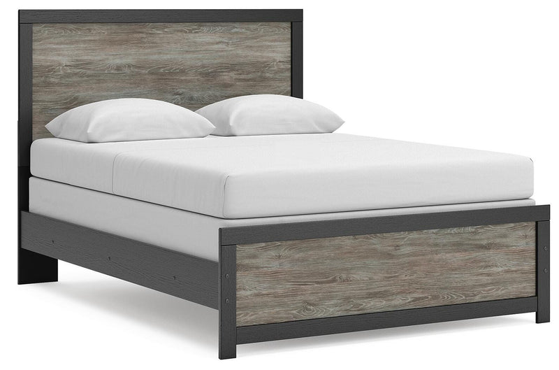 Ashley Furniture Broachmyn Bed with a stylish angle view showcasing the elegant headboard and frame design.