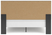 Ashley Furniture Broachmyn Bed with a sturdy wooden frame and elegant design, shown from the back view.