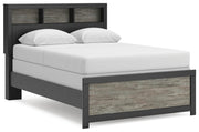 Ashley Furniture Broachmyn Bed with a stylish wooden frame, shown from a side angle in this image.