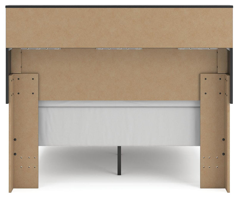 Ashley Furniture Broachmyn Bed showcasing a stylish headboard and frame in a modern bedroom setting
