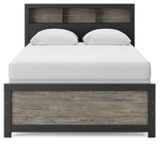 Ashley Furniture Broachmyn Bed with a stylish headboard, showcasing a modern design and detailed wood finish.