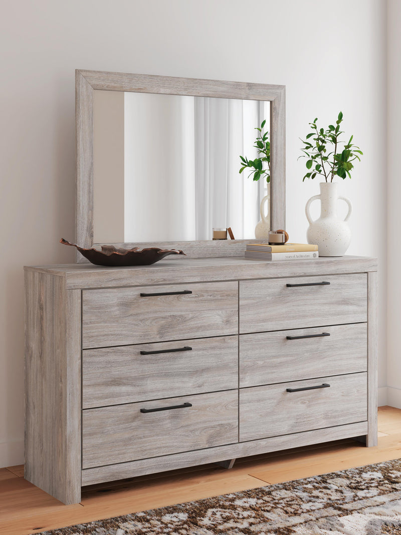 Ashley Furniture Broachmyn dresser and mirror set, featuring a wooden dresser with a matching large mirror for bedroom decor.