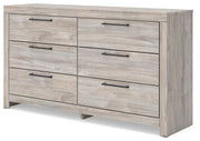 Ashley Furniture Broachmyn dresser with an attached mirror, showcasing a classic wooden design and elegant hardware.