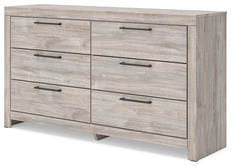 Ashley Furniture Broachmyn dresser with an attached mirror, showcasing a classic wooden design and elegant hardware.