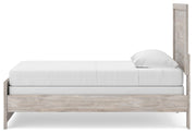 Ashley Furniture Broachmyn Bed with a wooden frame and headboard, shown in a side view with a warm finish.