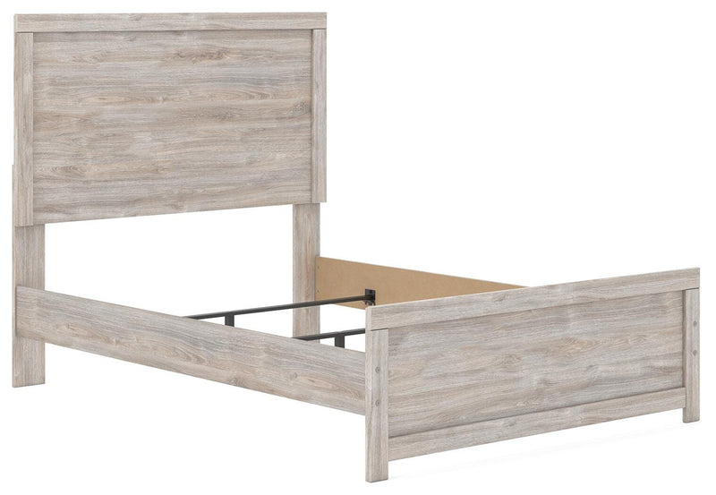 Ashley Furniture Broachmyn Bed with elegant wooden frame, shown at an angle highlighting its classic design and sturdy construction.