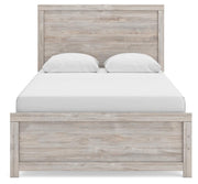 Ashley Furniture Broachmyn Bed with a headboard featuring a sleek, modern design in a bedroom setting.