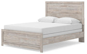 Ashley Furniture Broachmyn Bed with a stylish headboard and elegant design, shown from an angled side view.