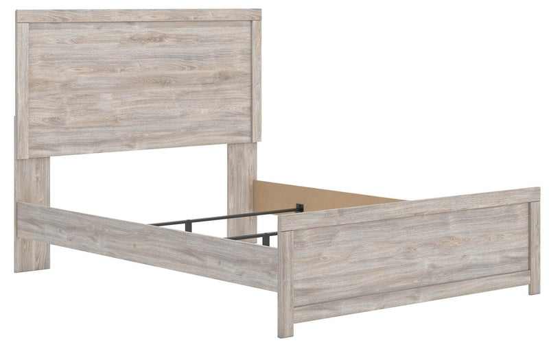 Ashley Furniture Broachmyn Bed with a stylish wooden frame, angled view showcasing its elegant headboard and classic design.