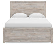 Ashley Furniture Broachmyn Bed with a neutral upholstered headboard and stylish design, shown in a head-on view.