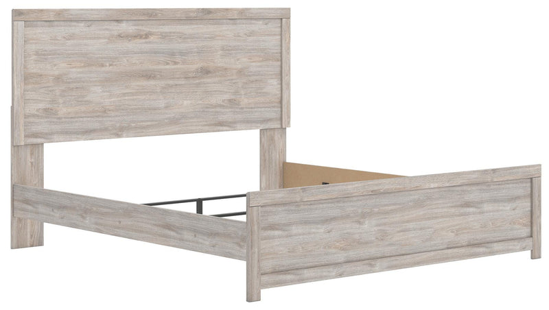 Ashley Furniture Broachmyn Bed with a stylish wooden frame, shown from an angled view highlighting the headboard and craftsmanship.
