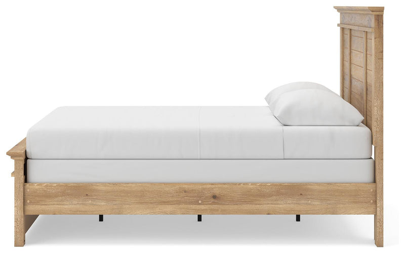 Ashley Furniture Makidern Bed showing a side view with a wooden frame and neutral upholstery, highlighting its modern design.