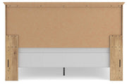 Ashley Furniture Makidern Bed with a sturdy wooden frame and classic design shown from the back view.