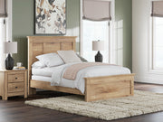 Ashley Furniture Makidern Bed with a stylish wooden frame and neutral-toned headboard, shown in a well-lit bedroom setting.