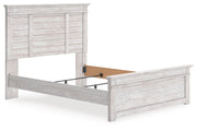 Ashley Furniture Makidern Bed featuring a stylish wooden frame with a high headboard and modern design in a bedroom setting