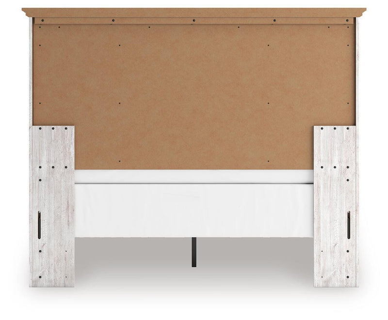 Ashley Furniture Makidern bed frame with a dark wood finish and a classic headboard design.