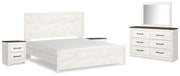 Ashley Furniture Gerridan bedroom set with a modern bed frame, matching nightstands, and dresser in a stylish bedroom scene.