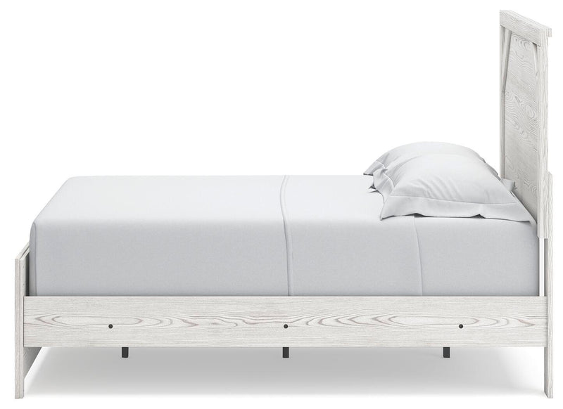 Ashley Furniture Gerridan Youth Bed with a sturdy wooden frame and clean design, shown from a side angle.