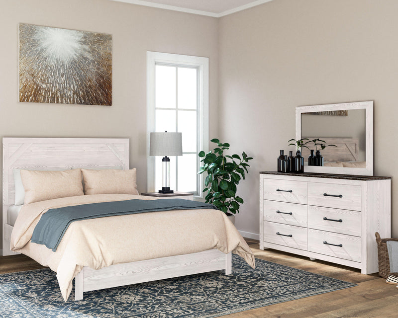 Ashley Furniture Gerridan bedroom set featuring a stylish bed frame, matching nightstands, and coordinating dresser in a modern design.