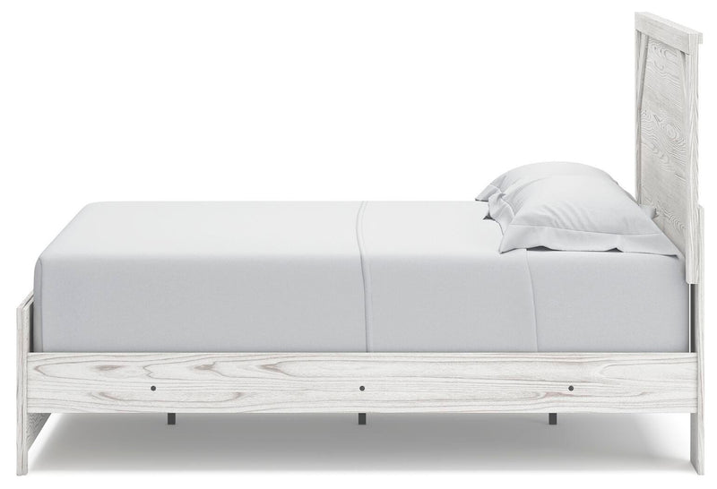 Ashley Furniture Gerridan bedroom set featuring a bed, nightstands, and dresser in a modern design, shown from a side angle.