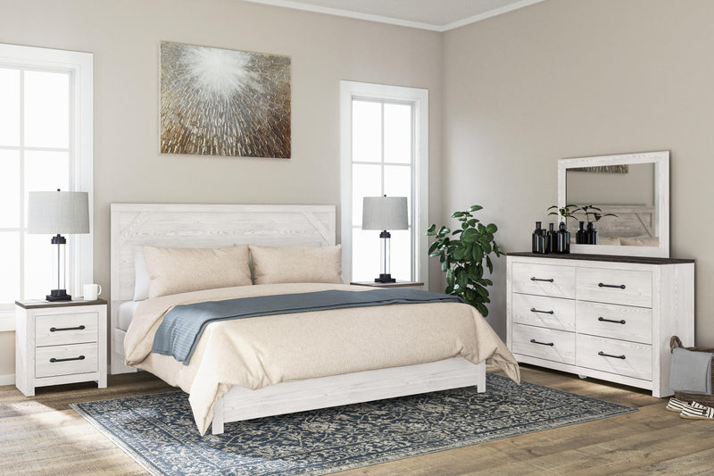 Ashley Furniture Gerridan bedroom set with a wooden bed frame, matching nightstands, and elegant bedroom decor.