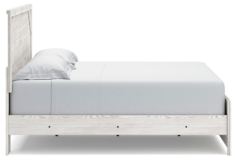 Ashley Furniture Gerridan bedroom set with a bed, nightstands, and dresser in a modern bedroom scene.