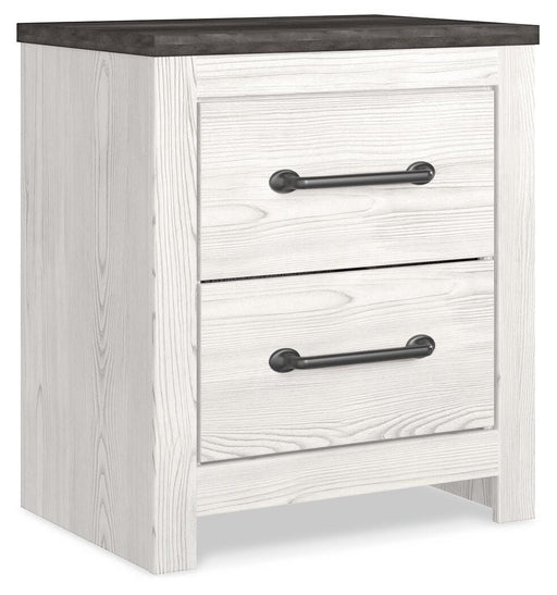 Ashley Furniture Gerridan nightstand with a closed drawer and sleek wood finish, shown from an angled side view.