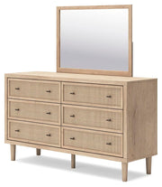 Ashley Furniture Cielden dresser with matching mirror, featuring wood finish and sleek hardware, shown from an angled side view.