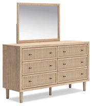 Ashley Furniture Cielden dresser with matching mirror, featuring wood finish and sleek hardware, shown from an angle.