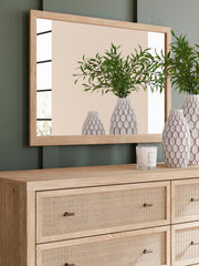Ashley Furniture Cielden dresser with matching mirror, showcasing a polished wooden finish and modern design details.