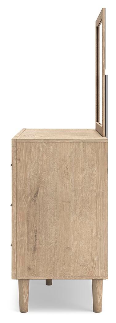 Ashley Furniture Cielden dresser with matching mirror, featuring sleek wood finish and contemporary design, shown from a side angle.