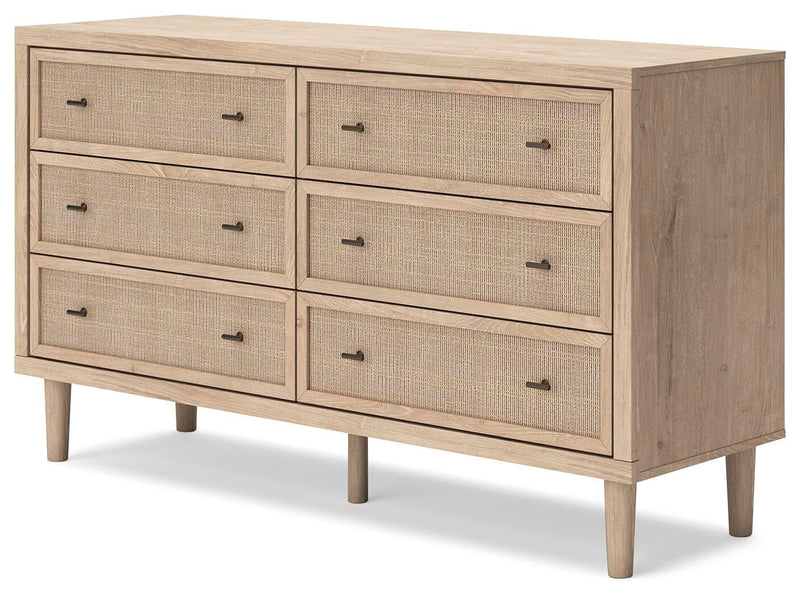 Ashley Furniture Cielden dresser shown from an angle, featuring a modern design with multiple drawers and a smooth finish.