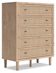 Ashley Furniture Cielden chest of drawers, angled view showing dark wood finish and multiple spacious drawers.