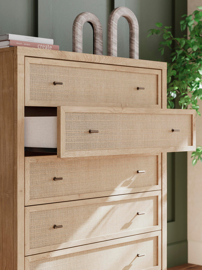 Ashley Furniture Cielden chest of drawers with multiple drawers and wooden finish, detailed image showing classic bedroom storage furniture.