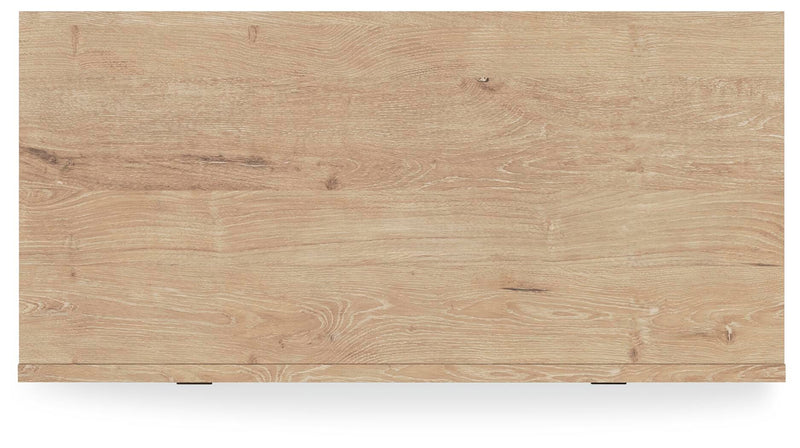 Ashley Furniture Cielden Chest of Drawers with a wooden finish and multiple drawers for storage, shown in a close-up view.
