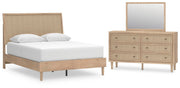 Ashley Furniture Cielden bedroom set with matching dresser, mirror, and nightstands in a modern design, shown in a stylish bedroom setting.