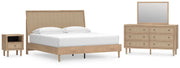 Ashley Furniture Cielden bedroom set featuring a bed with a padded headboard and matching nightstands in a cozy bedroom scene.