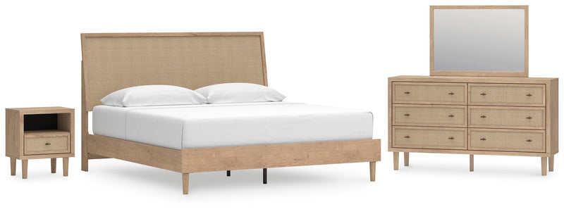 Ashley Furniture Cielden bedroom set featuring a bed with a padded headboard and matching nightstands in a cozy bedroom scene.