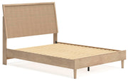 Ashley Furniture Cielden bedroom set with a bed, nightstands, and dresser, viewed from an angle in a modern bedroom setting.