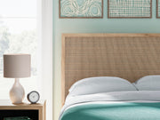 Ashley Furniture Cielden bedroom set with a dark wood finish, including a bed frame, dresser, and nightstands in a stylish bedroom.